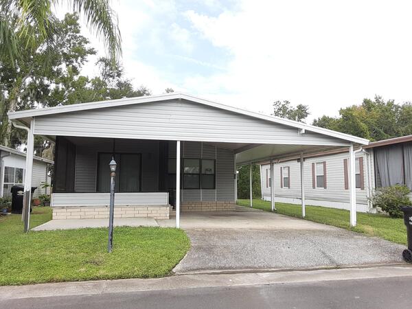 Lakeland, FL Mobile Home for Sale located at 308 Pridgeon Street Highland Village